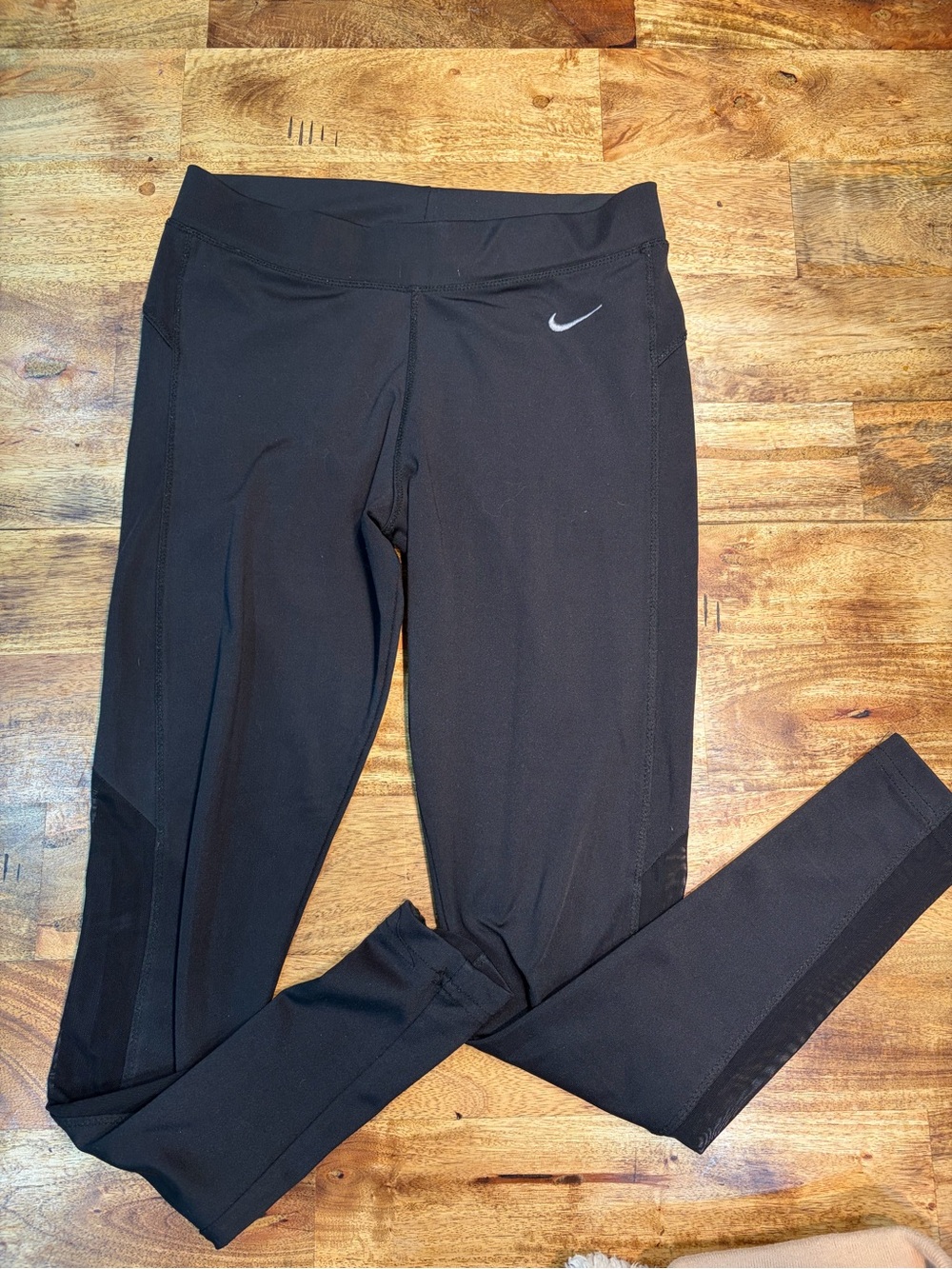 Nike Black women’s Performance Leggings with mesh Swoosh